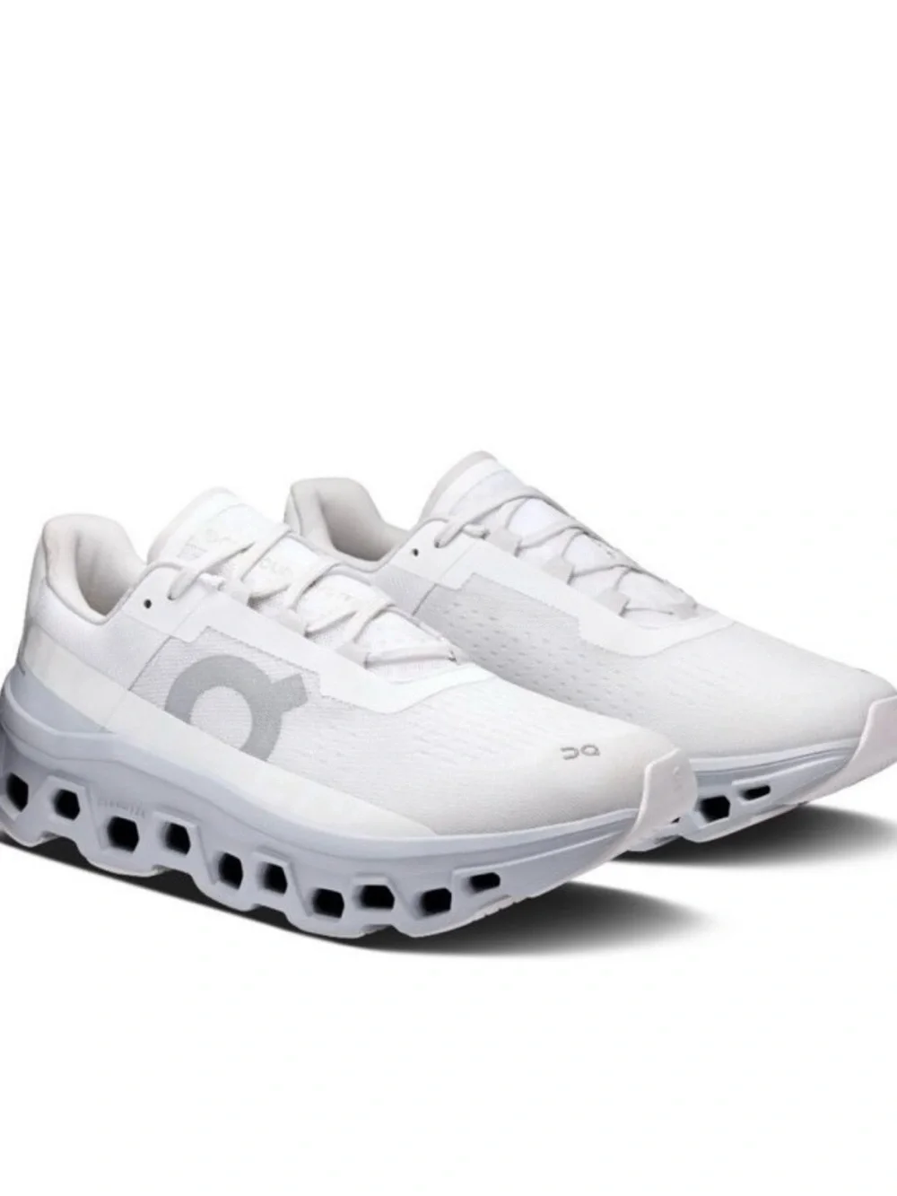 On Running Women’s athletic shoes in White and Light Gray